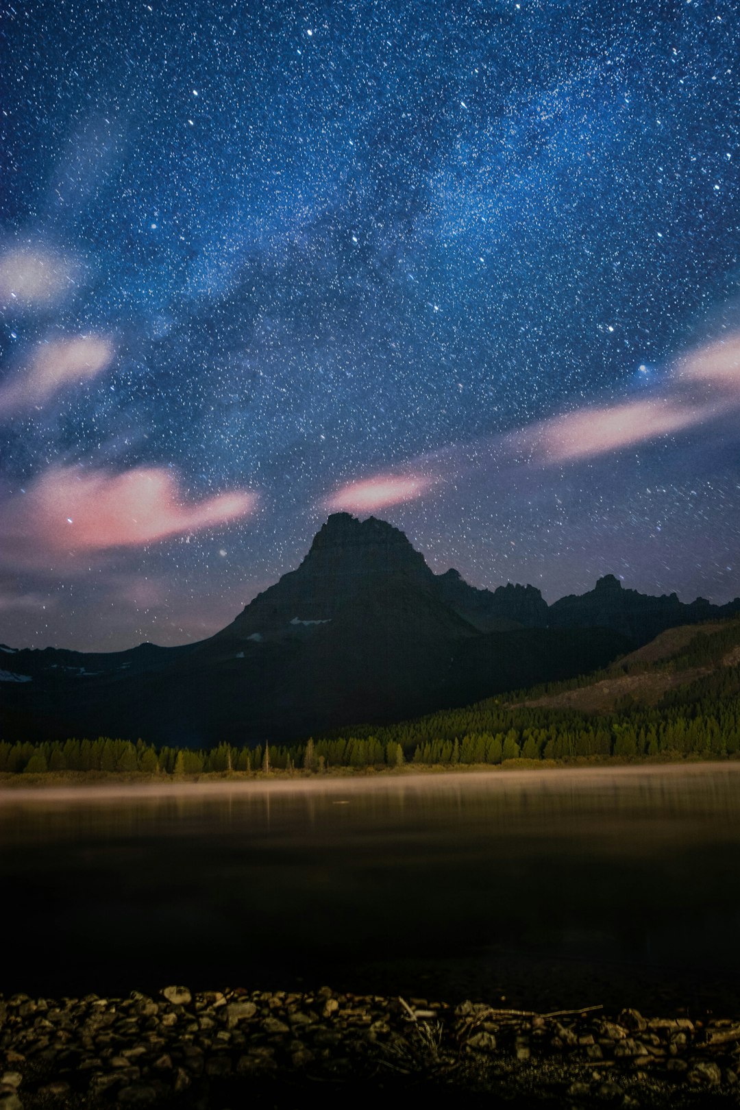 silhouette of mountain near body of water