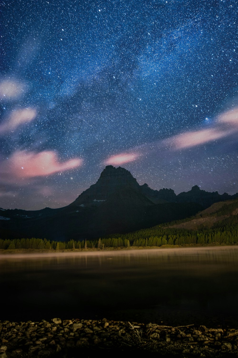 silhouette of mountain near body of water