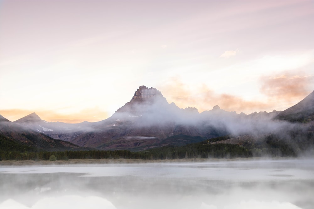 landscape photography of mountains covered with white fog