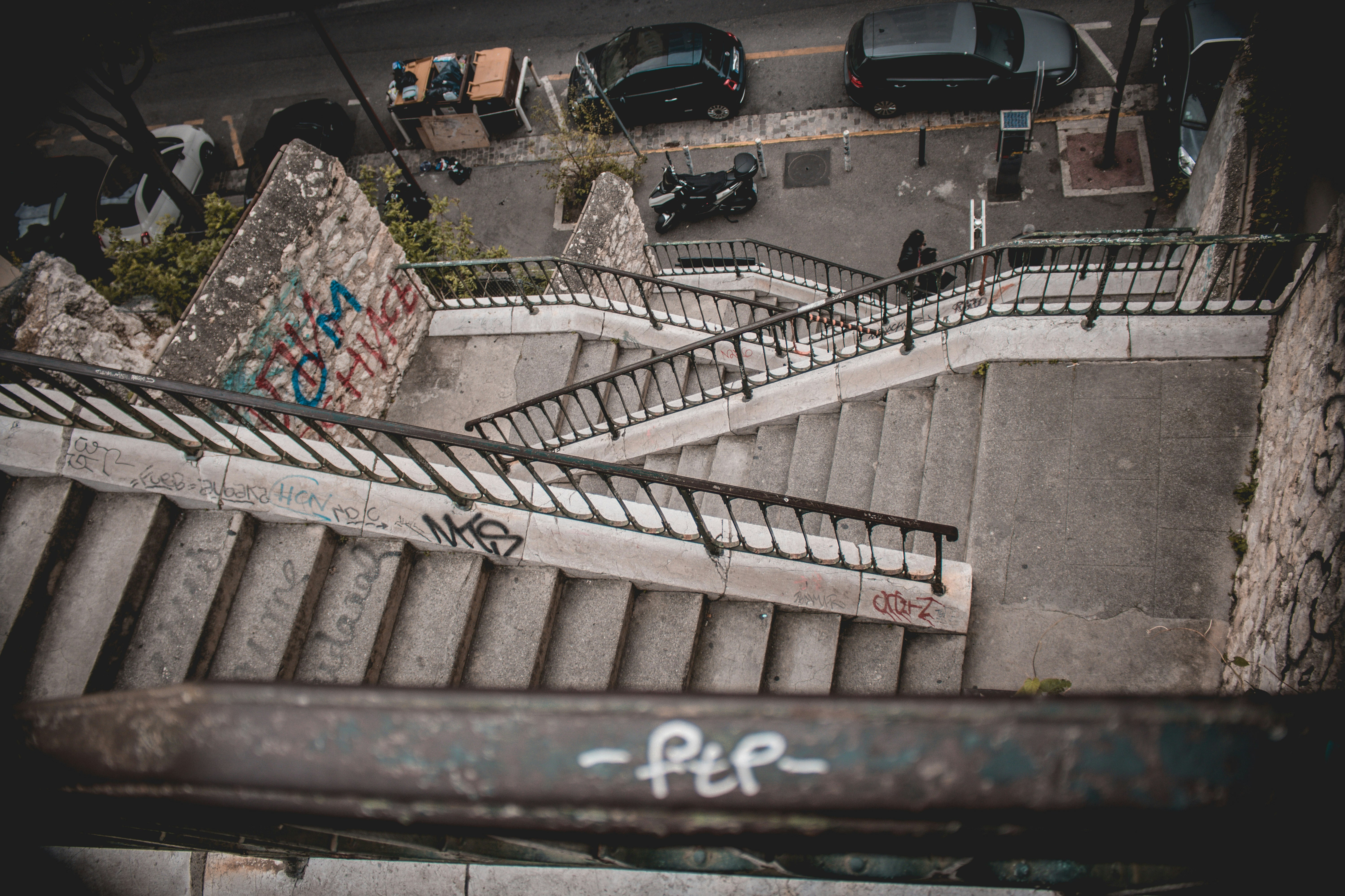 low-angle photography of gray concrete staircase