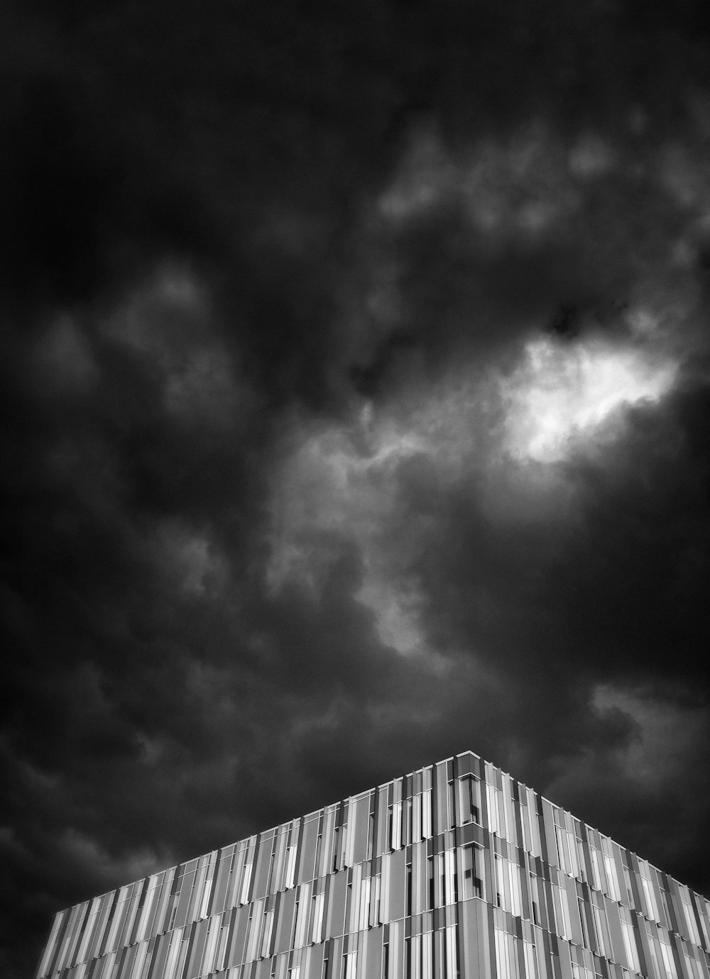 building under black cloud