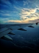A dynamic photo of an aviation influencer capturing a sleek private jet at sunset.