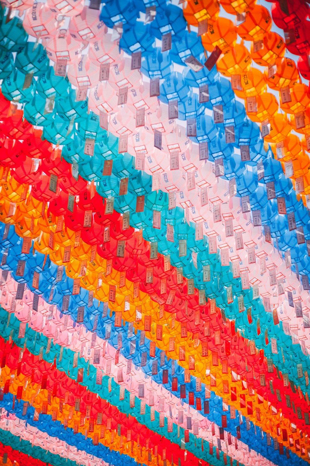 a close up of a multi colored blanket