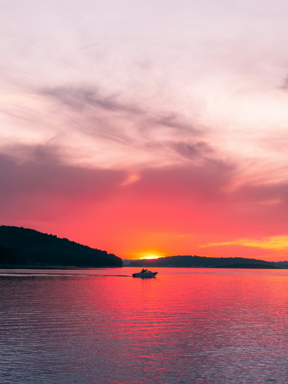 boat on body of water during daytime