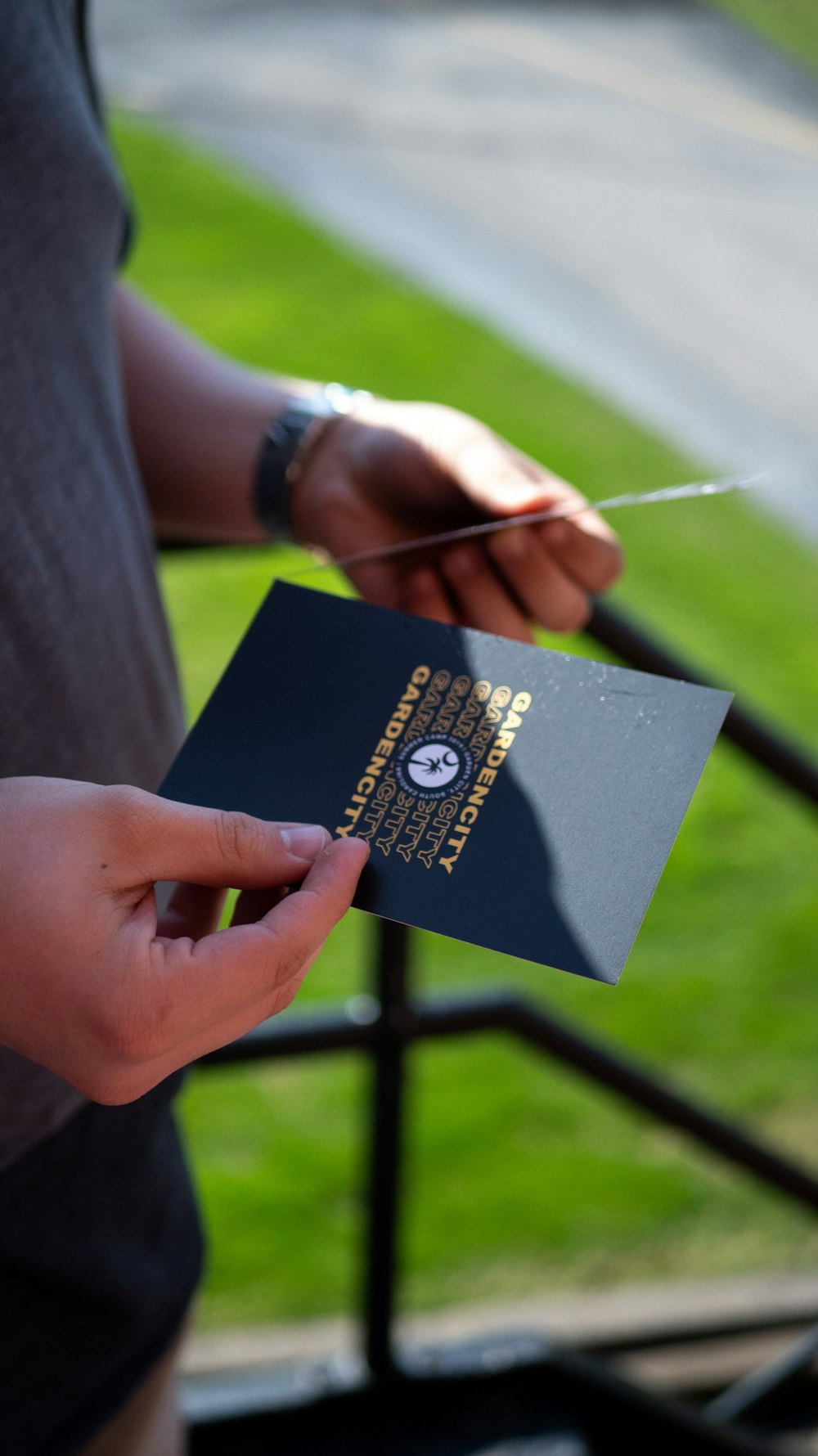 close-up photography person holding cards