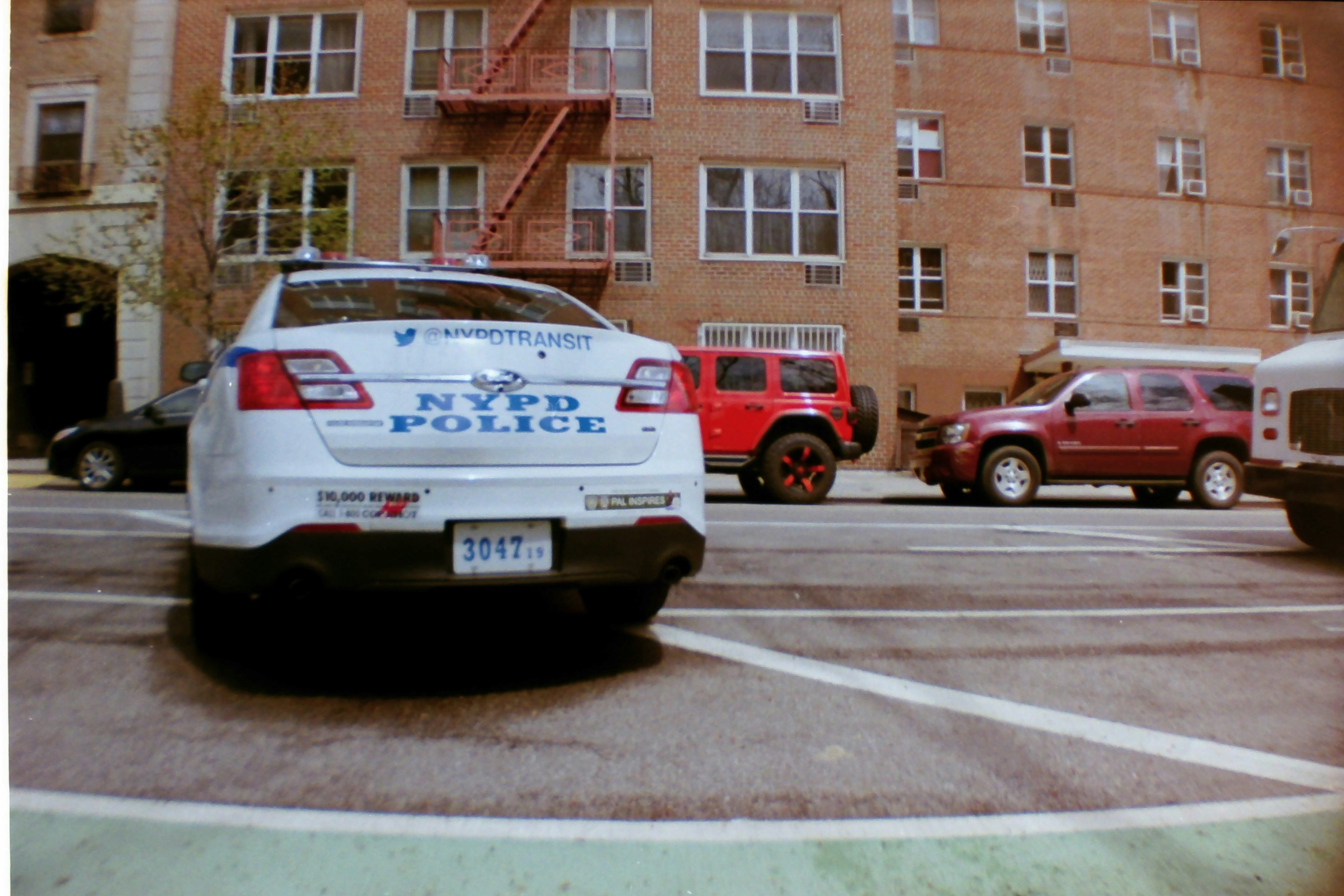white vehicle on road