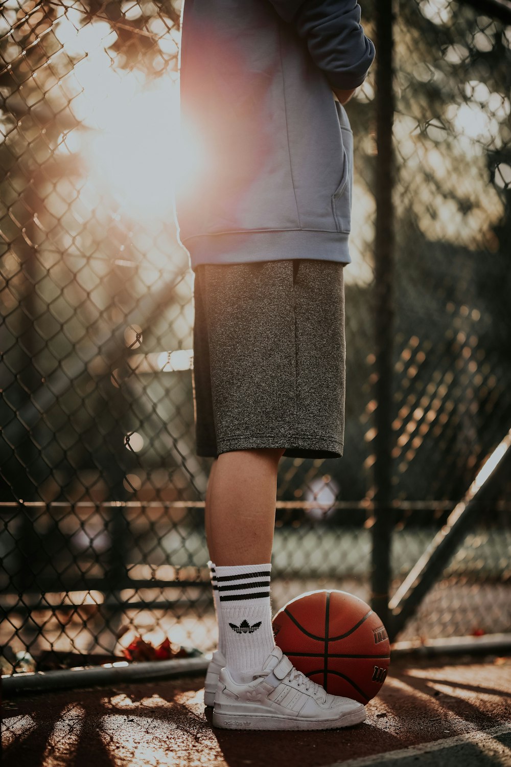 boy wearing grey shorts