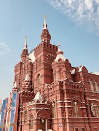 low-angle photography of red cathedral