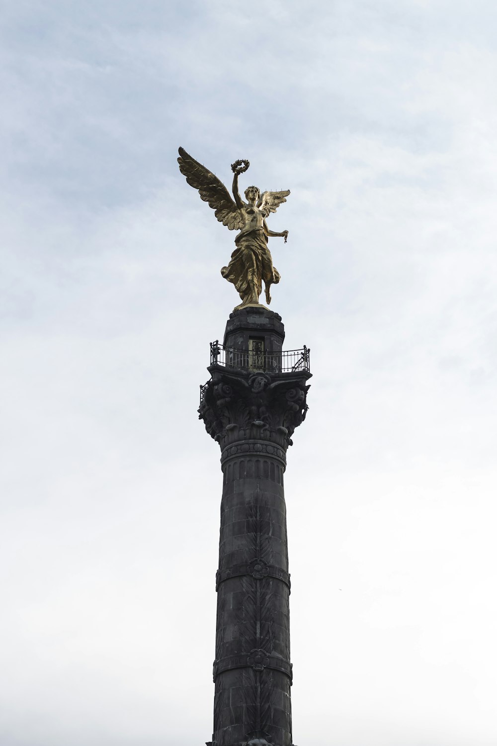 low angle view photography of statue