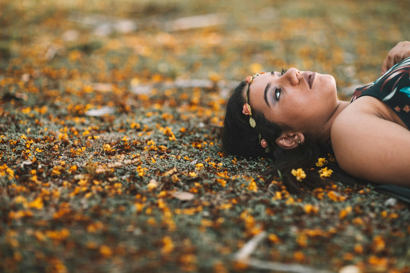 Canon EF 85mm F1.2L II USM sample photo. Woman lies in grass photography