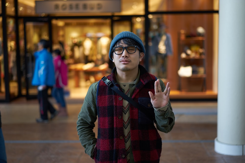 man wearing black framed eyeglasses