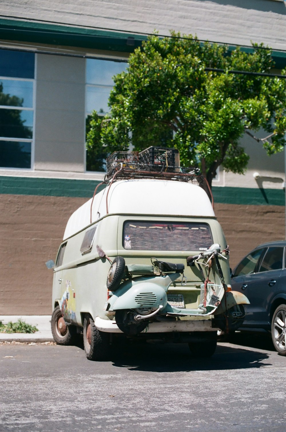 white vehicle parked near building