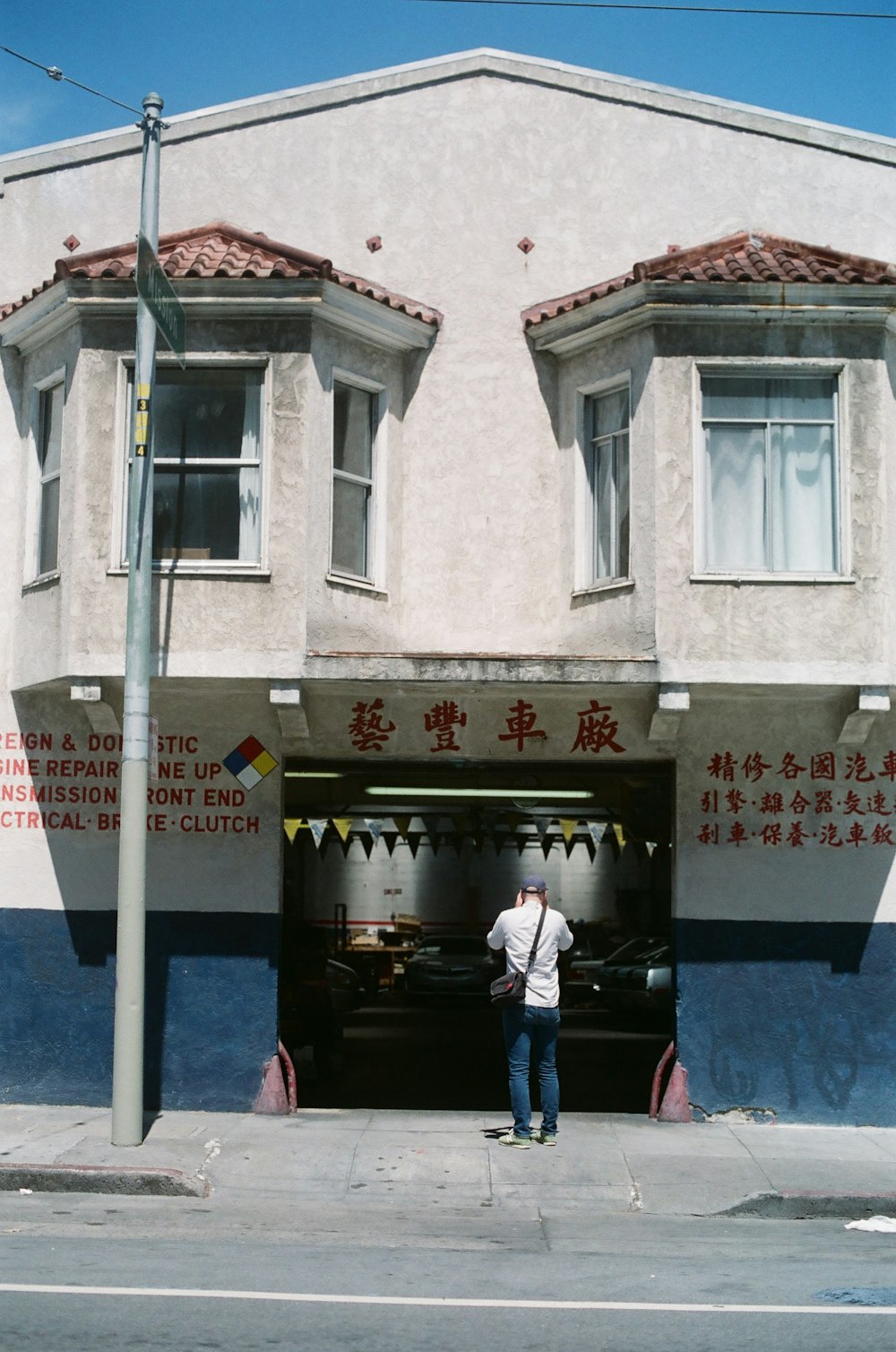 man standing in \front of the building