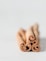 brown textile on white surface