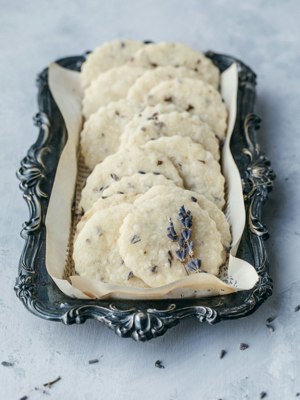 white cookies in black tray\