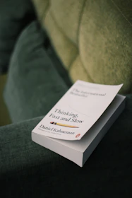 white and black labeled book