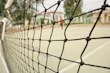 Photo of sturdy sports nets with a ball in mid-air