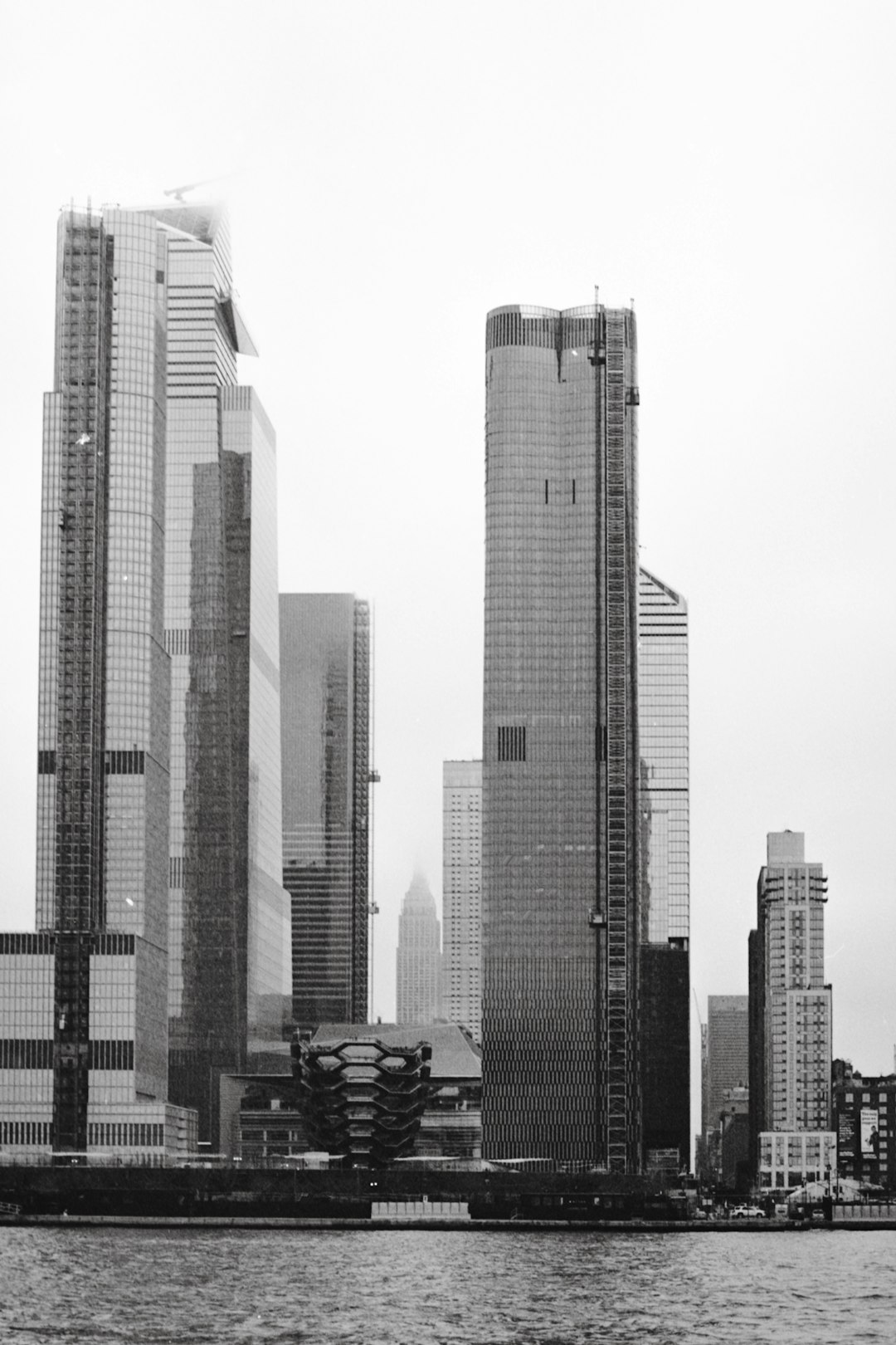 greyscale photography of highrise building