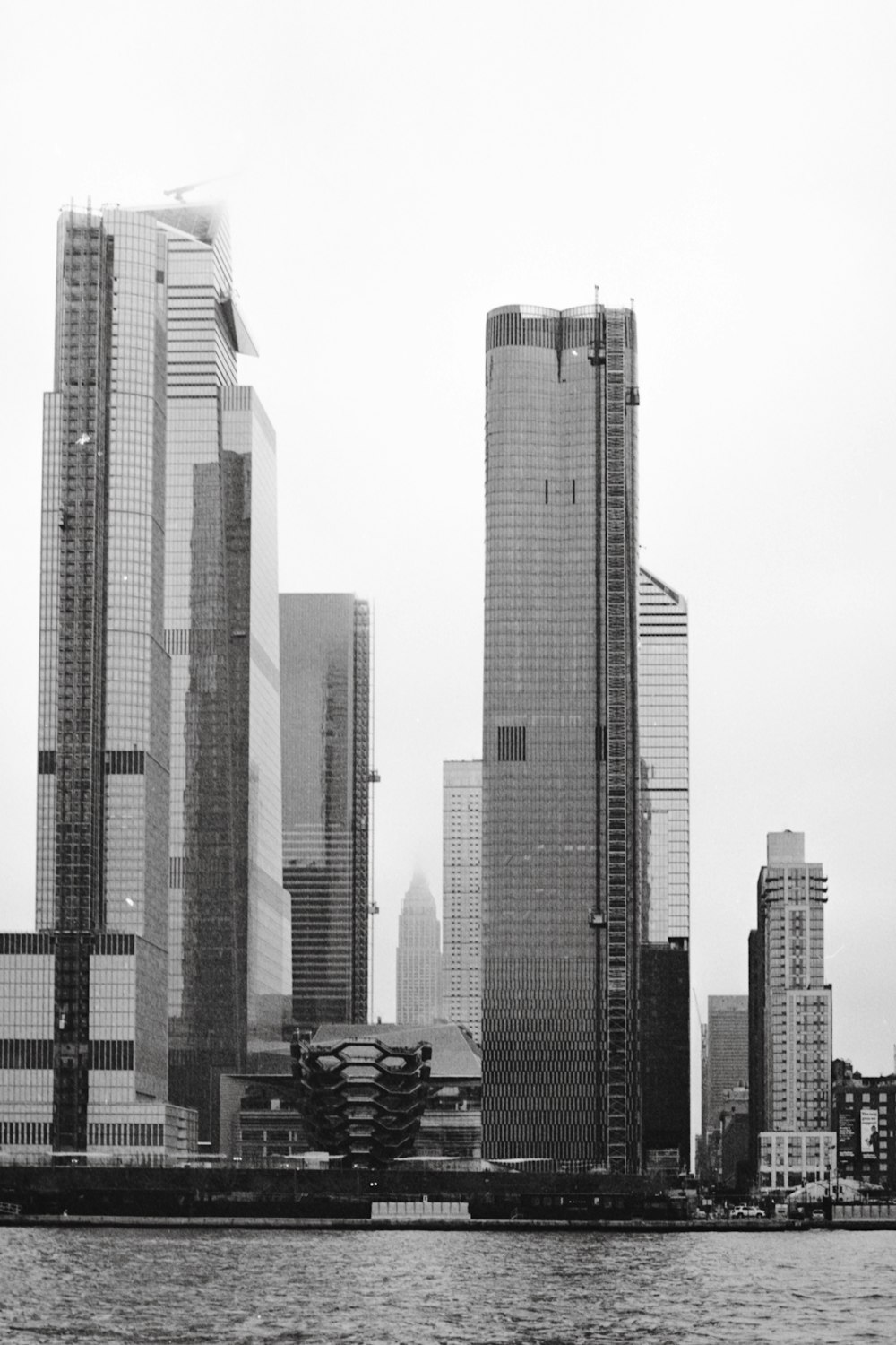 greyscale photography of highrise building