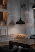 tufted sofa near coffee table