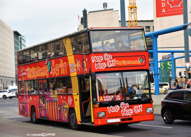 red double deck bus during daytime