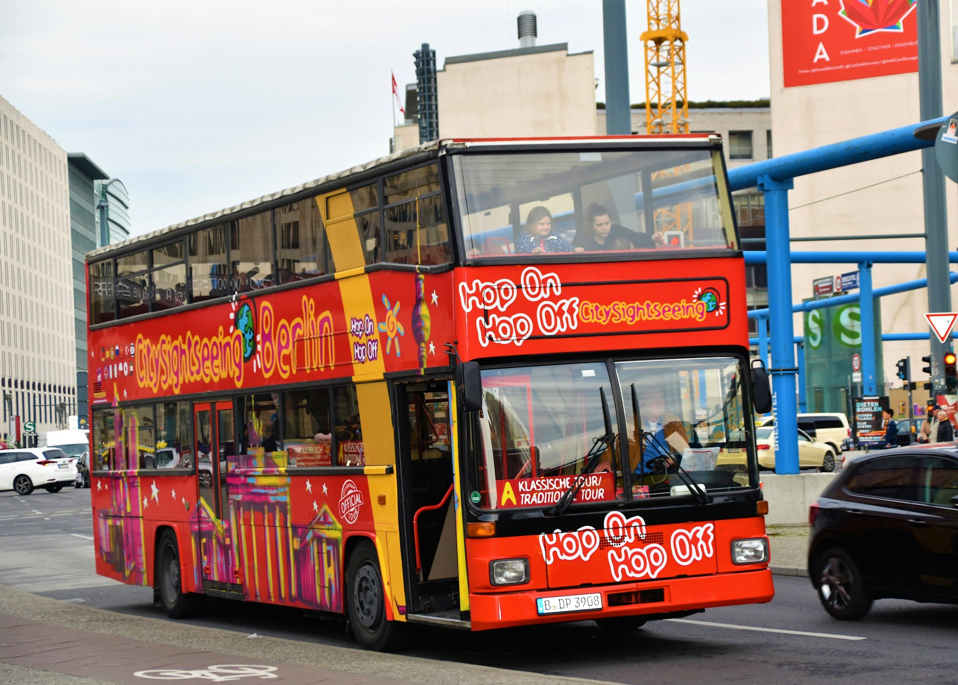 red double deck bus during daytime
