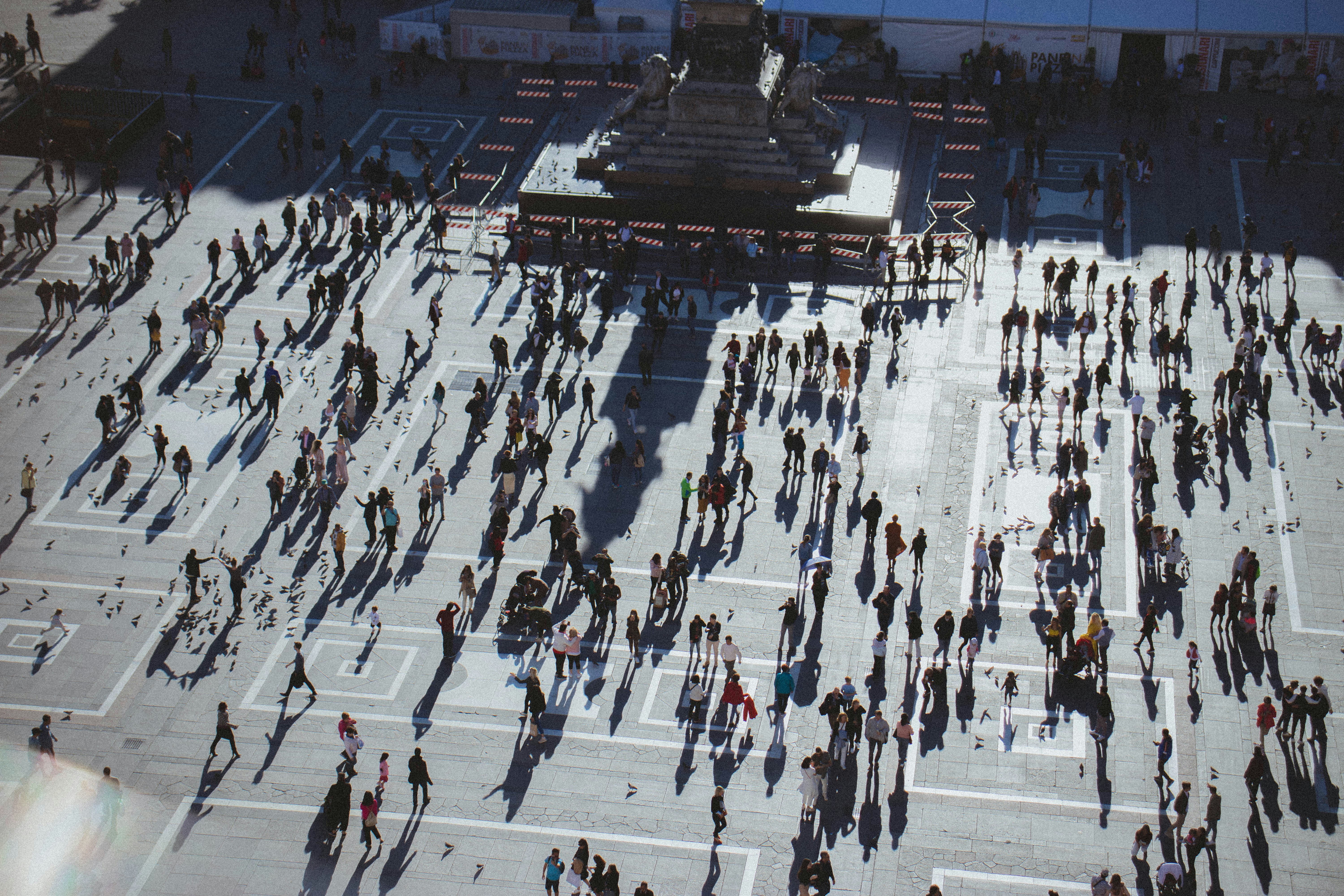 people near statue