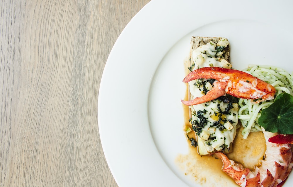 shrimp dish on white ceramic plate