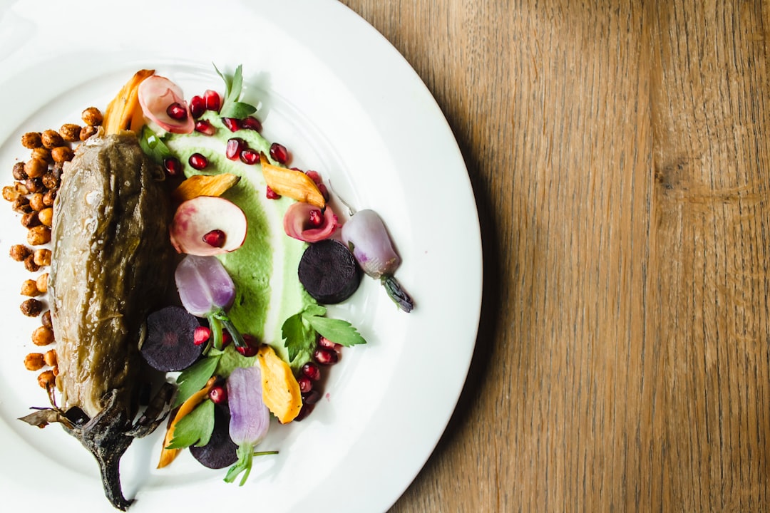 brown eggplant on round white plate