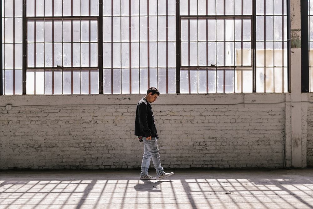 person walking in a building during daytime