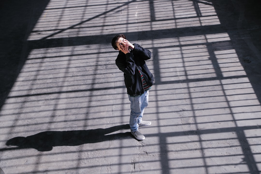 high-angle photography of black zip-up jacket