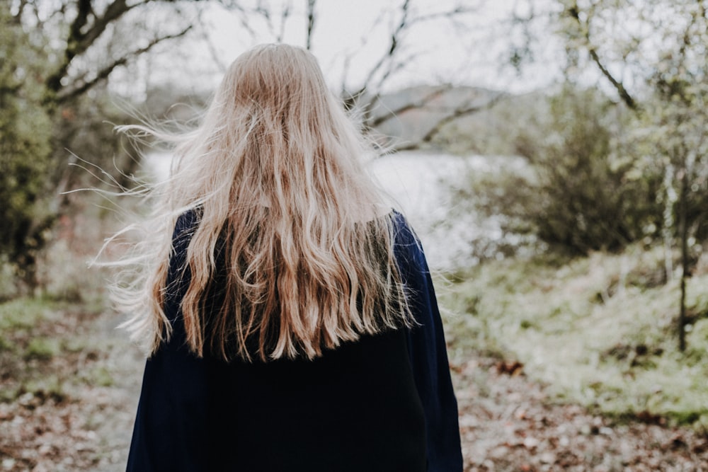 shallow focus photo of person in black jacket