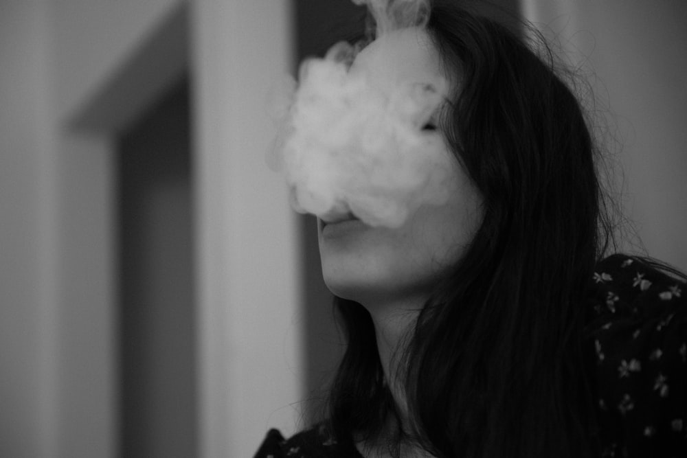 close-up photo of smoking woman