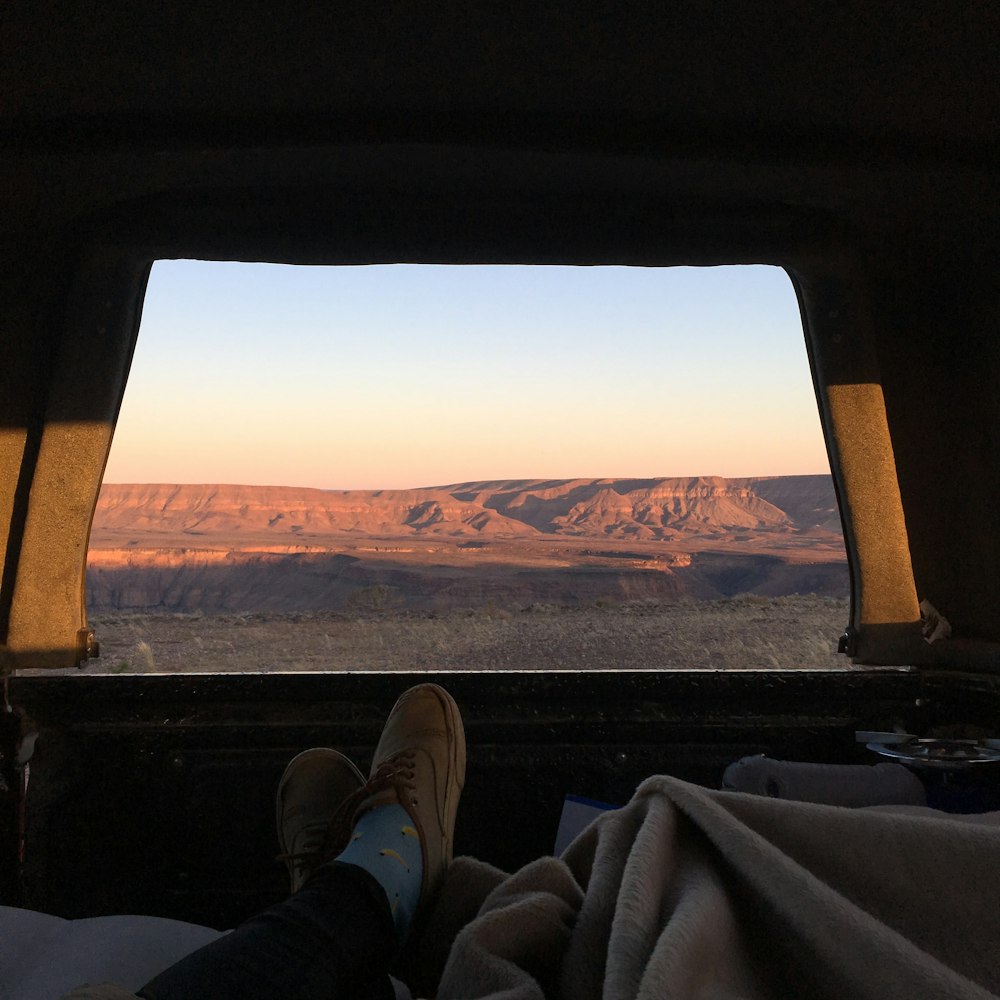 person lying inside tent