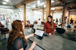 two women near tables