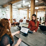 two women near tables