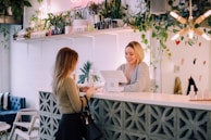 woman facing on white counter