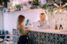 woman facing on white counter