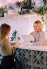 woman facing on white counter