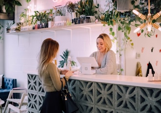 woman facing on white counter