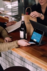 person playing card on POS machine