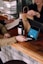 person playing card on POS machine