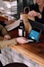 person playing card on POS machine