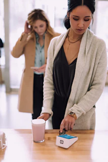 woman using white device
