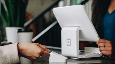 white monitor on desk