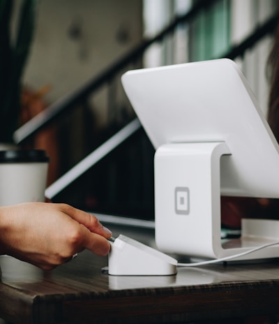 white monitor on desk