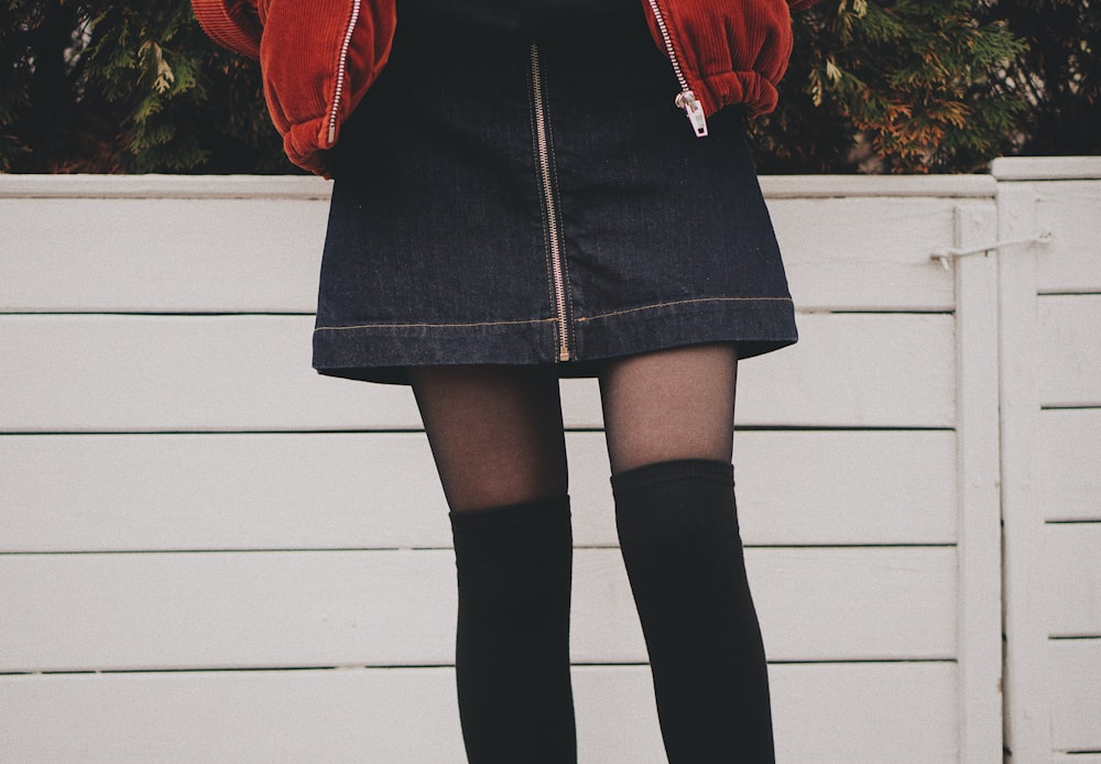 woman wearing black denim skirt and thigh high socks photo – Free Skirt  Image on Unsplash