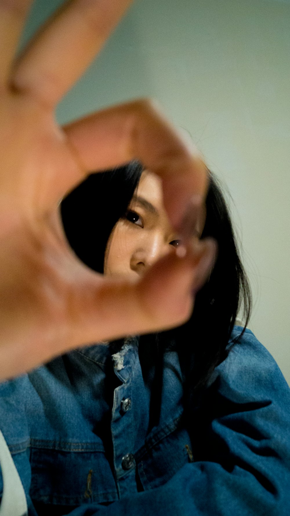 woman in denim jacket