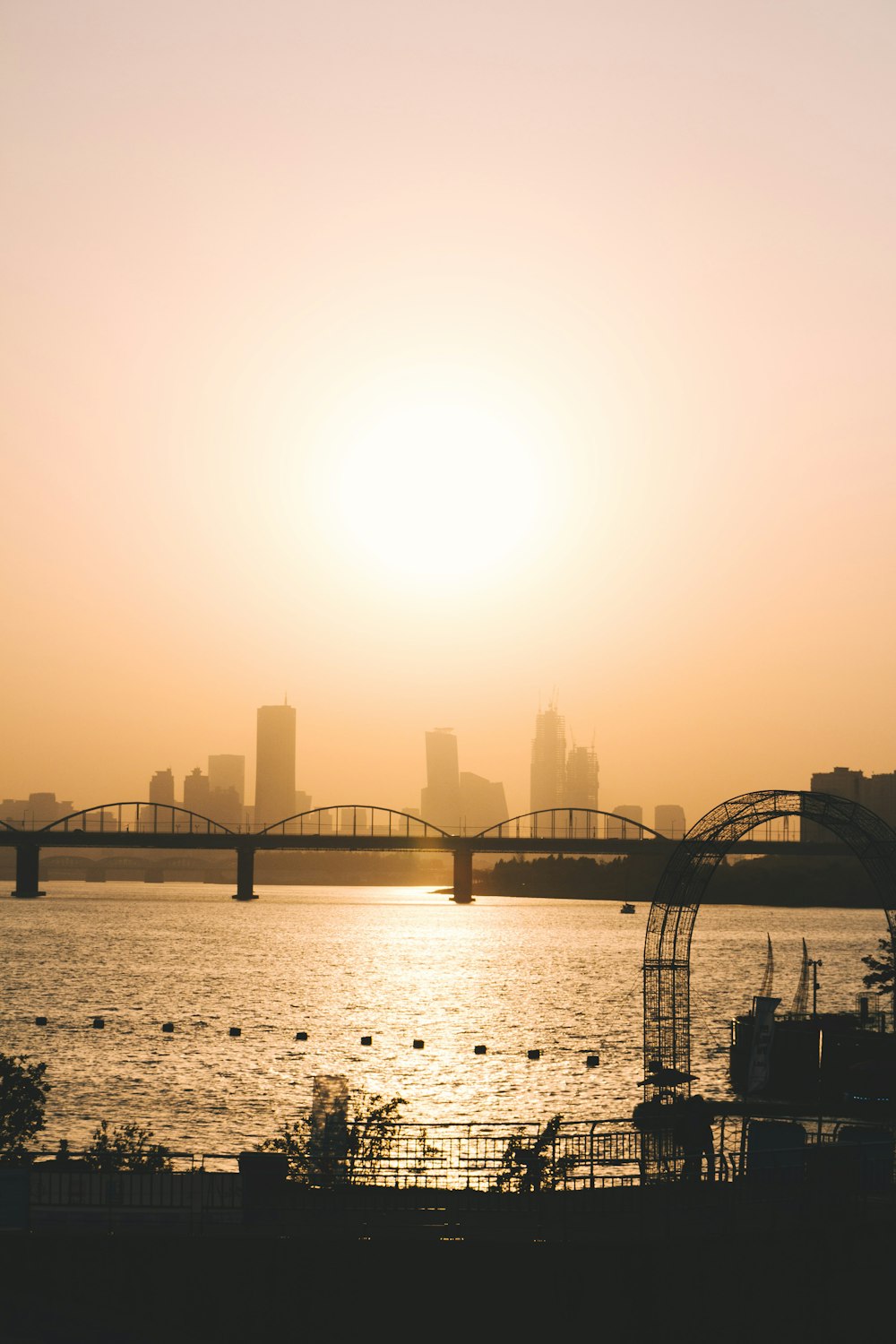 silhouette of bridge during golden hour