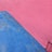 A wall featuring two painted sections, one in blue and the other in pink. The colors are applied in a rough manner, creating an abstract, textured look.
